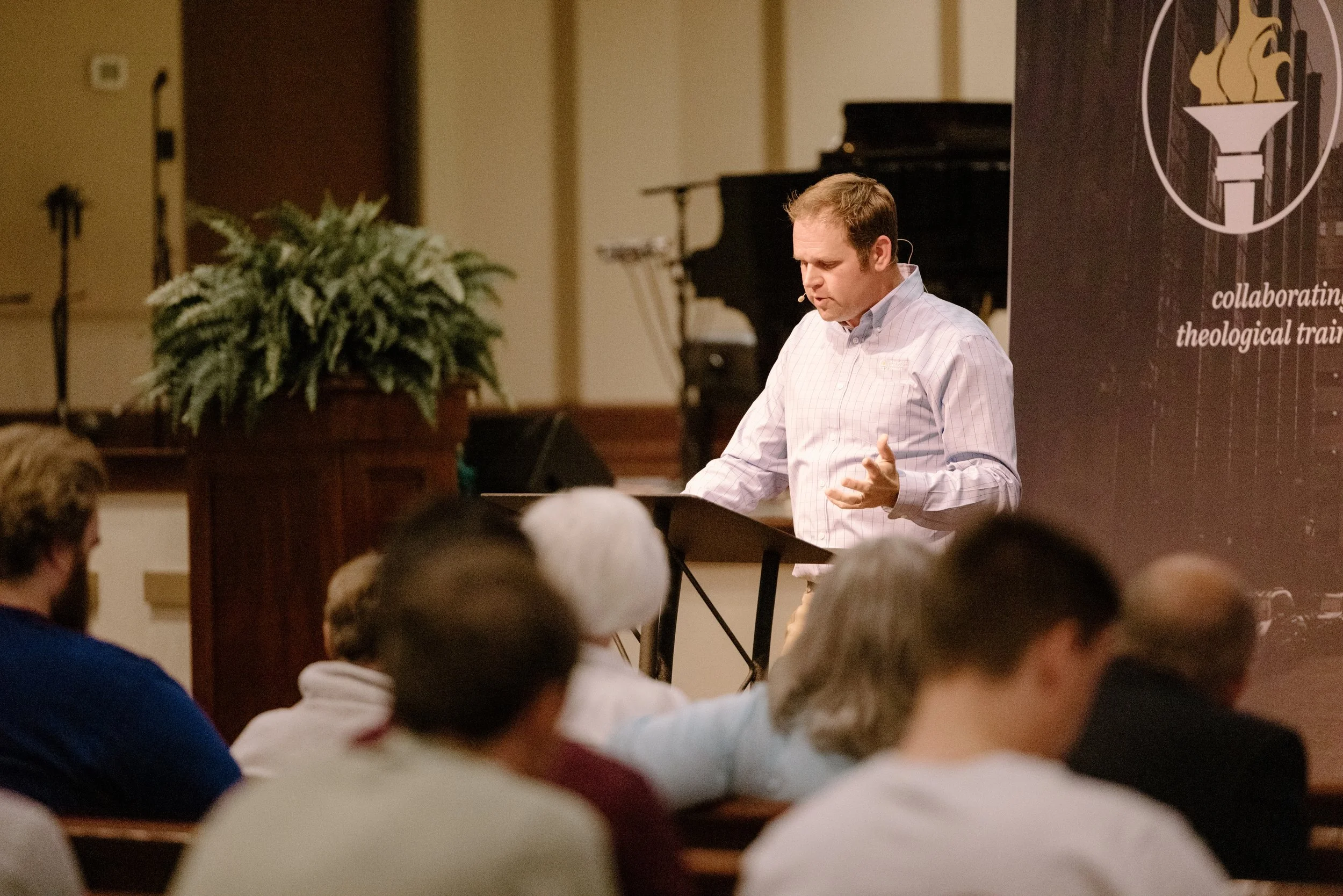 A professor teaching an evening class at Indianapolis Theological Seminary